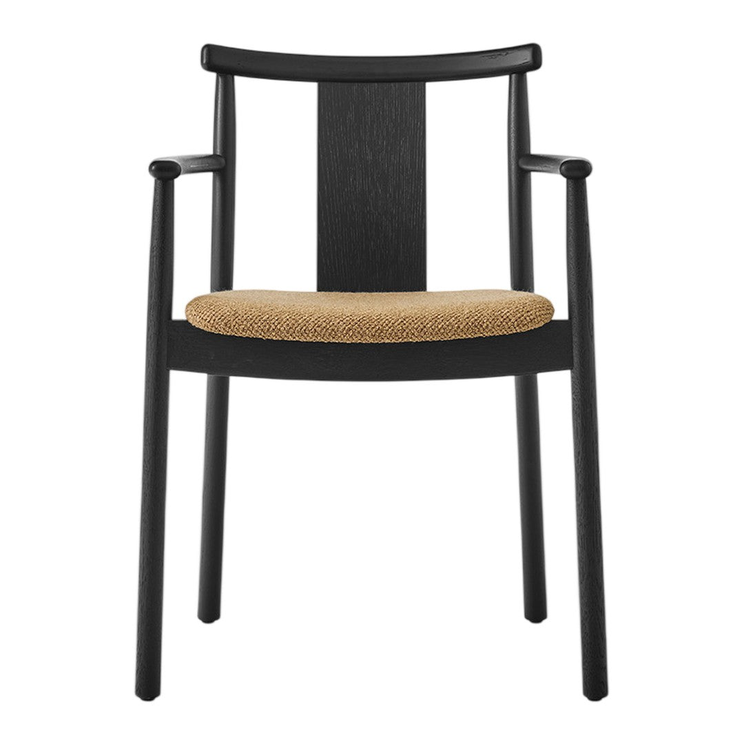 Black wooden chair with a smooth finish and a textured tan seat cushion for a modern aesthetic.