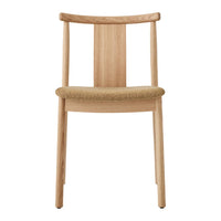 Natural wood chair with a light, minimalist design and woven beige seat, showcasing subtle texture and elegance.