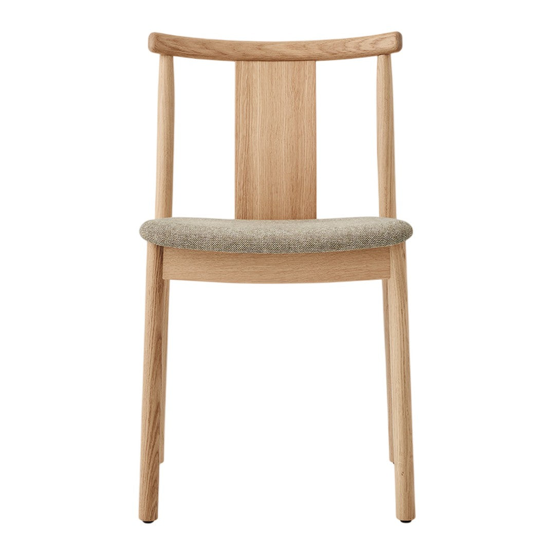 Natural wood chair with a light oak finish and a soft, neutral beige cushion. Simple, modern design.