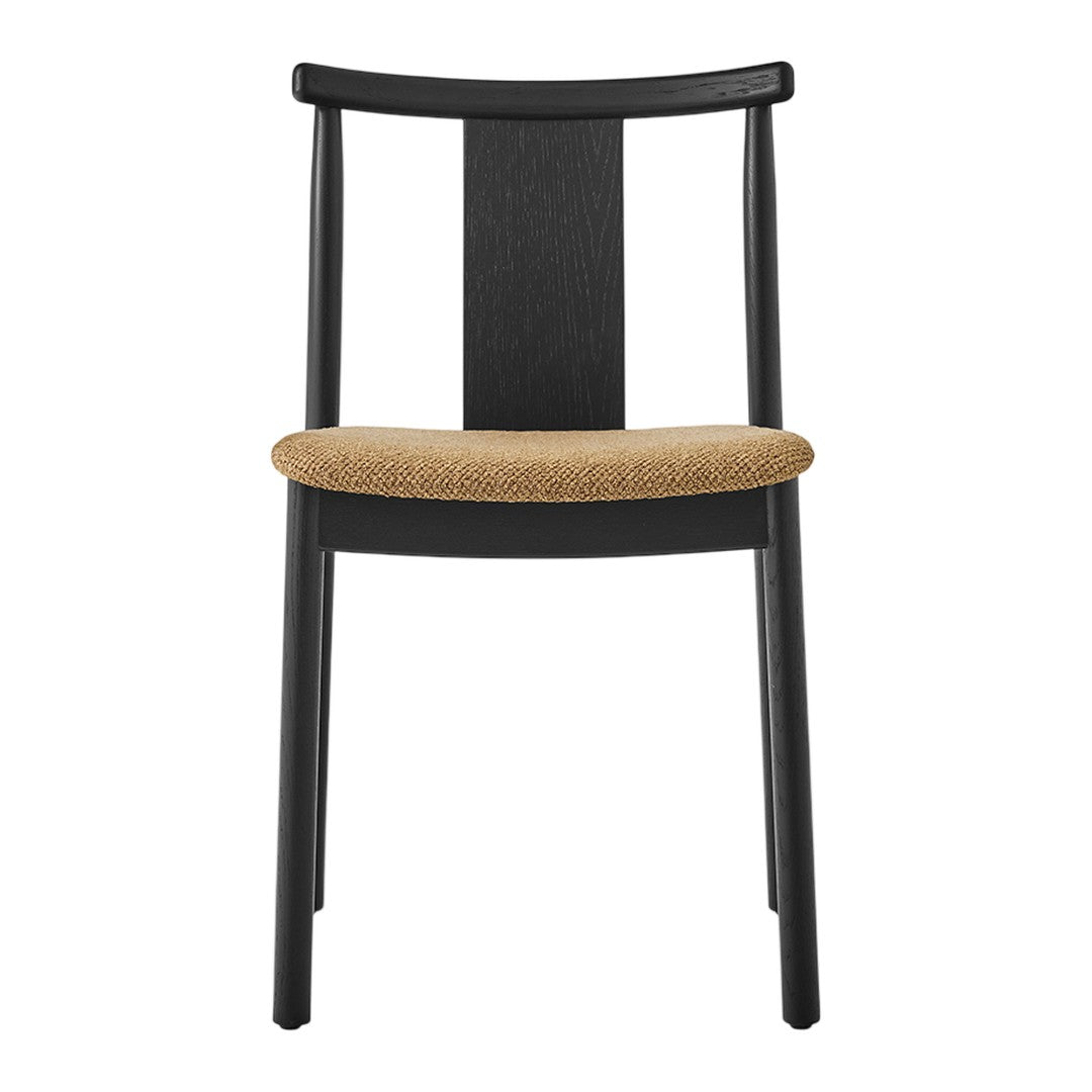 Black wooden chair with a textured tan seat cushion, sleek minimalist design, and open backrest.