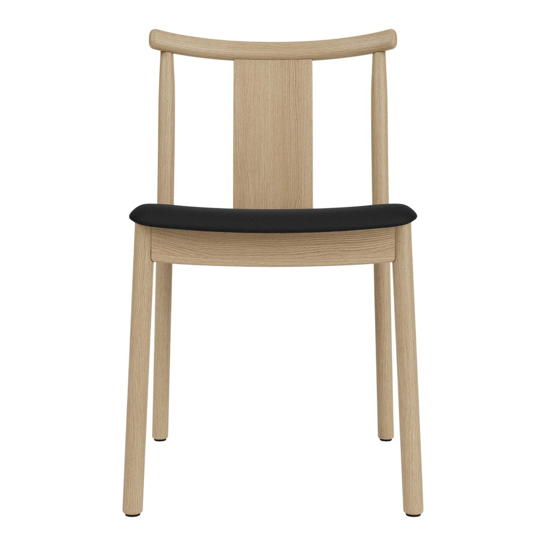 Light wood chair with a sleek black cushion, featuring a minimalistic design and smooth finishes.