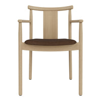 Light wood chair with a brown fabric seat and simple, modern design. Ideal for stylish dining spaces.