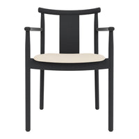 Black wooden chair with a cream cushion, featuring a simple and modern design. Ideal for contemporary decor.