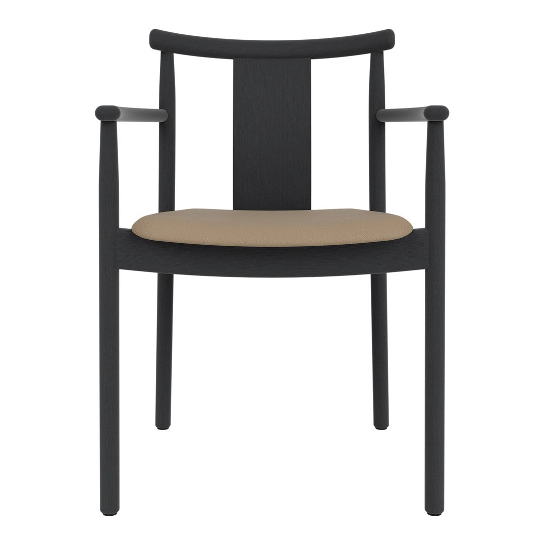 Black chair with a minimalist design and a beige cushion seat, featuring smooth, clean lines and no patterns.