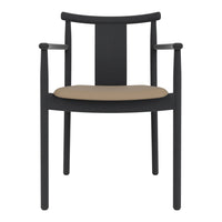 Black chair with a minimalist design and a beige cushion seat, featuring smooth, clean lines and no patterns.