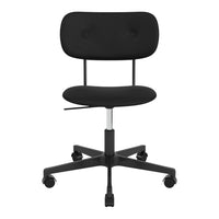 Black upholstered desk chair with a smooth finish and buttoned backrest on a sturdy base with wheels.