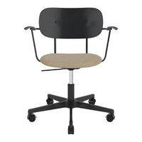 Black ergonomic office chair with a beige fabric seat, featuring a minimalist design and simple curved patterns.