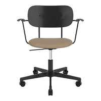 Black office chair with a minimalist design and a tan seat cushion, featuring a wheeled base for mobility.