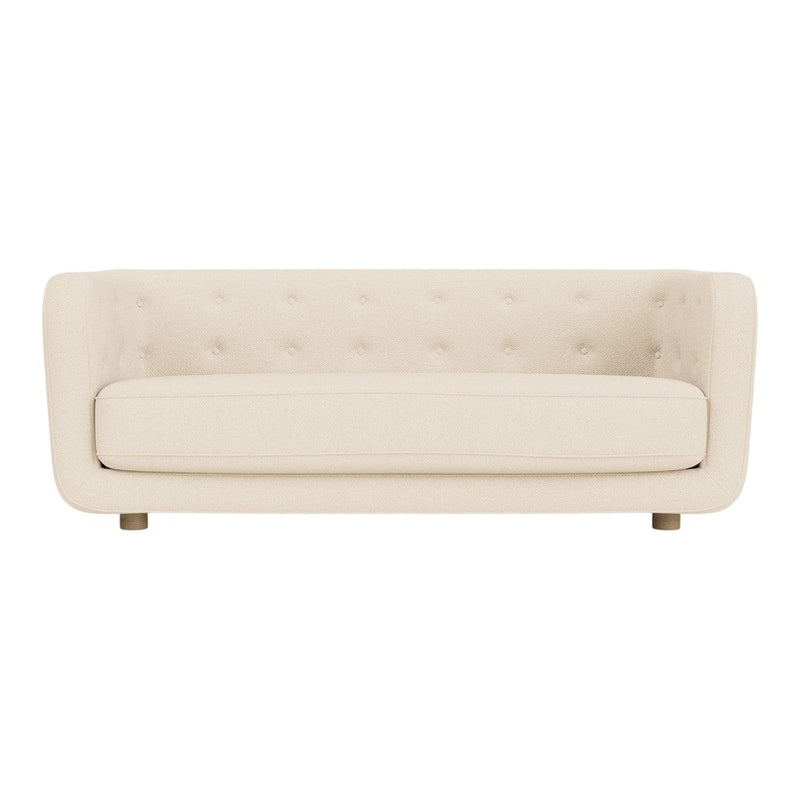 Cream upholstered sofa with a smooth texture and button-tufted design. Elegant and modern style for any living space.
