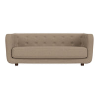 Beige tufted sofa with a smooth texture and simple, clean lines, ideal for modern decor.