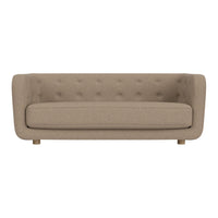 Light beige tufted sofa with a smooth, subtle texture and wooden legs. Perfect for modern living spaces.