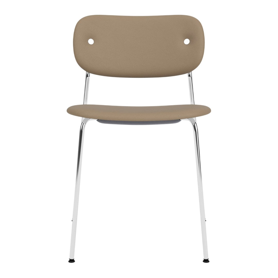 Beige modern chair with a minimalist design and chrome legs, featuring a smooth, solid color finish.