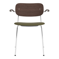 Woodgrain brown backrest, olive green seat, and stainless steel legs create a modern, minimalist chair design.