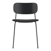Black chair with a sleek design, featuring a smooth, solid back and a textured seat pattern.