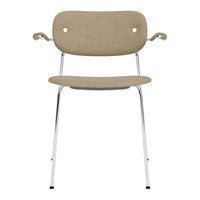 Beige upholstered chair with chrome legs and minimalistic design. Ideal for modern and stylish interiors.