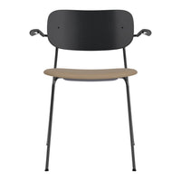 Black and tan chair with a sleek design, featuring a minimalist pattern and metal legs.