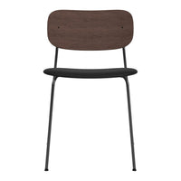 Modern chair featuring a dark wood backrest and black seat, complemented by sleek black metal legs.