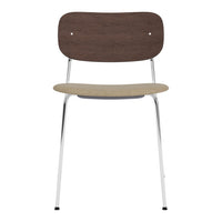 Brown wood backrest and seat with a beige cushion, chrome legs for a modern, minimalist design.