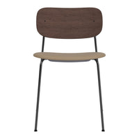 Brown wood back, beige seat, and black metal legs create a modern, minimalist chair design. Perfect for any decor.