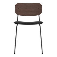 Black metal chair with a dark brown wooden backrest and curved seat design for a modern aesthetic.