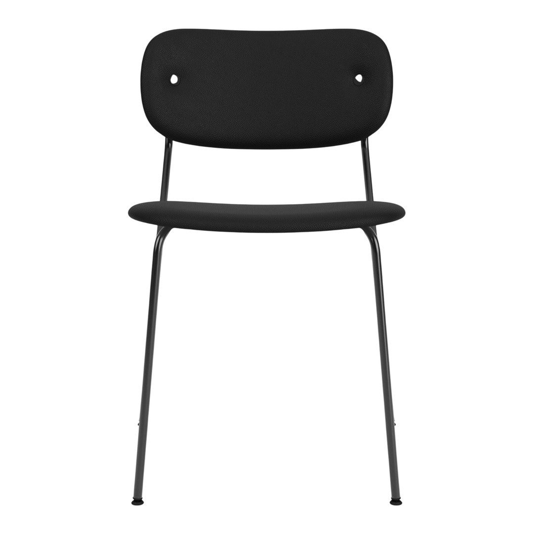 Sleek, modern black chair with a minimalist design and subtle round patterns on the backrest. Perfect for any decor.