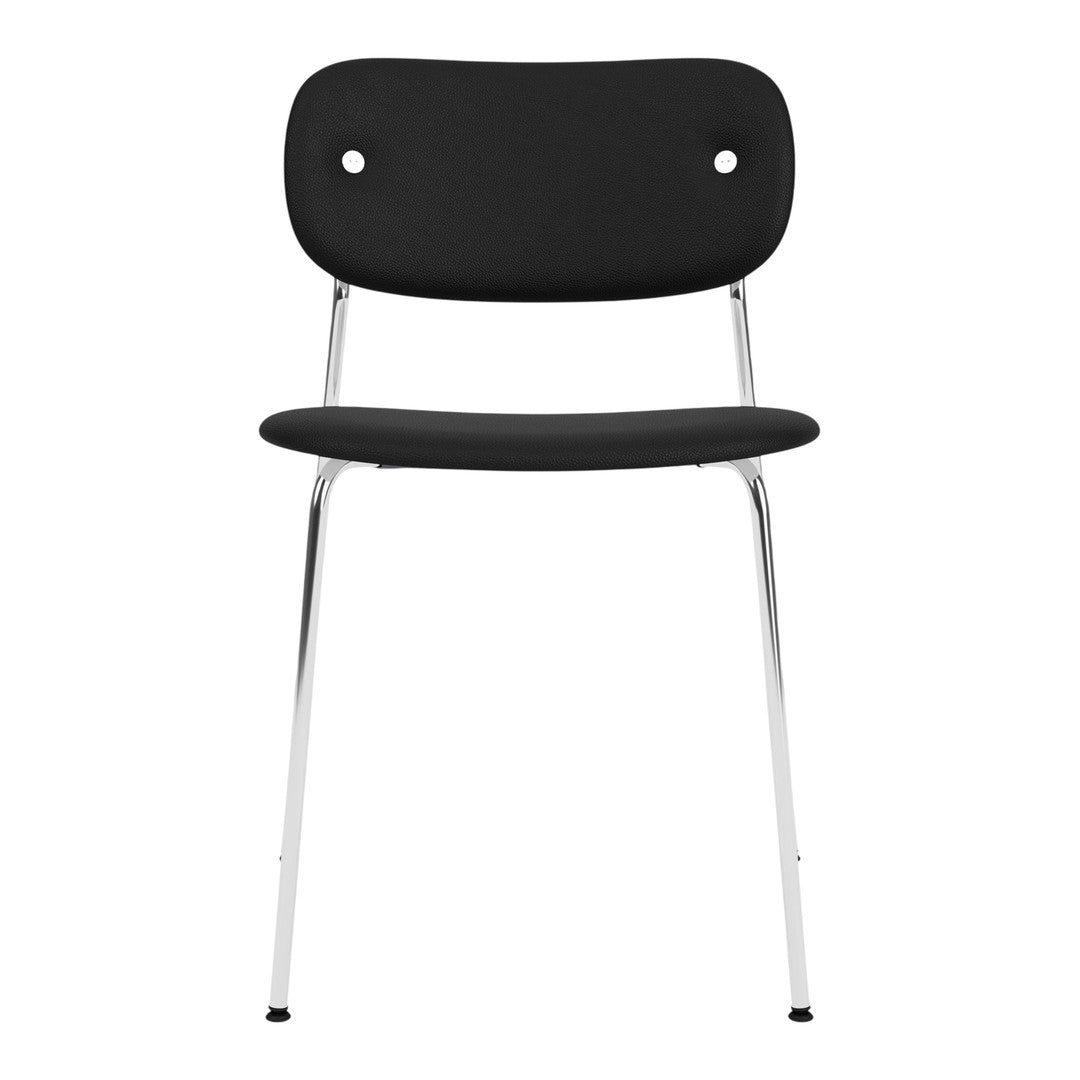 Black chair with a smooth finish and chrome legs, featuring a minimalist design with rounded back and seat.