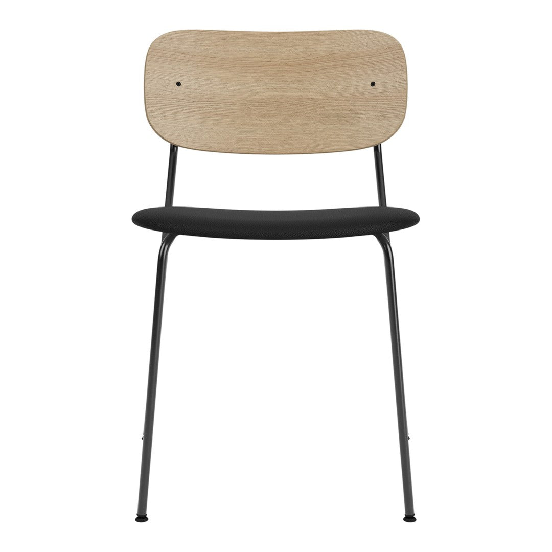 Minimalist chair with a natural wood backrest, black seat, and sleek black metal legs. Ideal for modern decor.