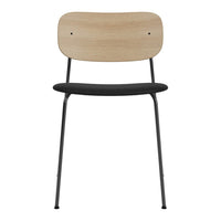 Minimalist chair with a natural wood backrest, black seat, and sleek black metal legs. Ideal for modern decor.