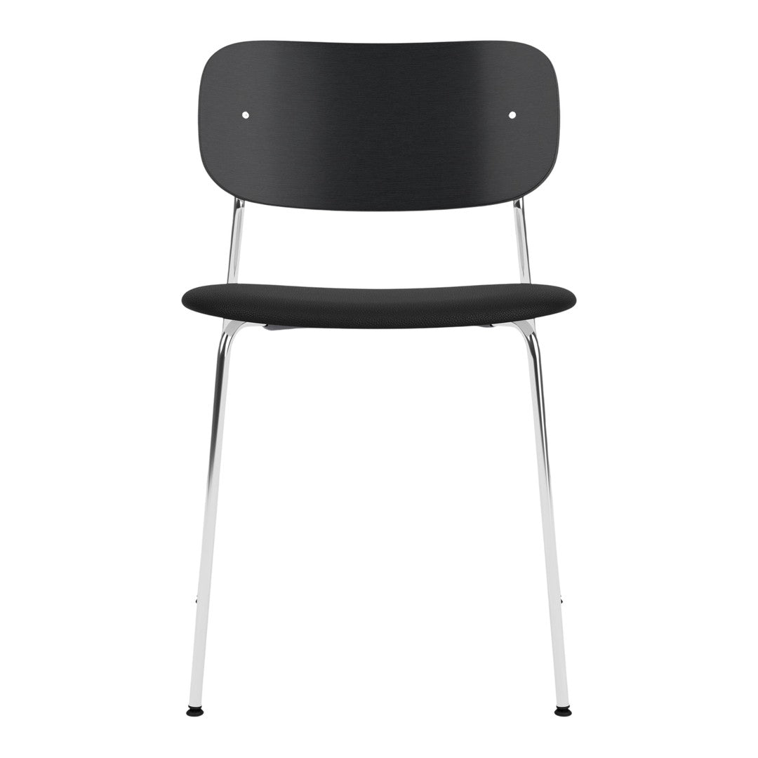 Sleek black chair with a minimalist design, featuring a smooth surface and chrome legs for a modern look.