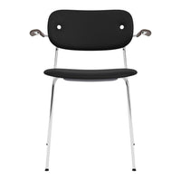 Black chair with minimalist design, featuring chrome accents and smooth, curved lines for modern style.