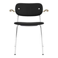 Black chair with a smooth finish, chrome legs, and light wood armrests, featuring a minimalist design.