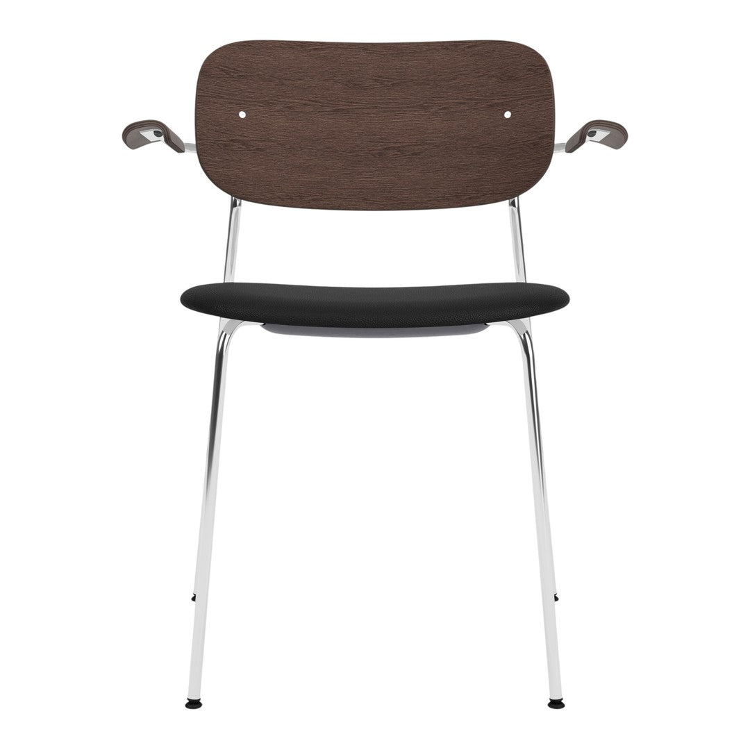 Modern chair with a dark wood backrest, sleek black seat, and shiny chrome legs. Stylish and minimalistic design.