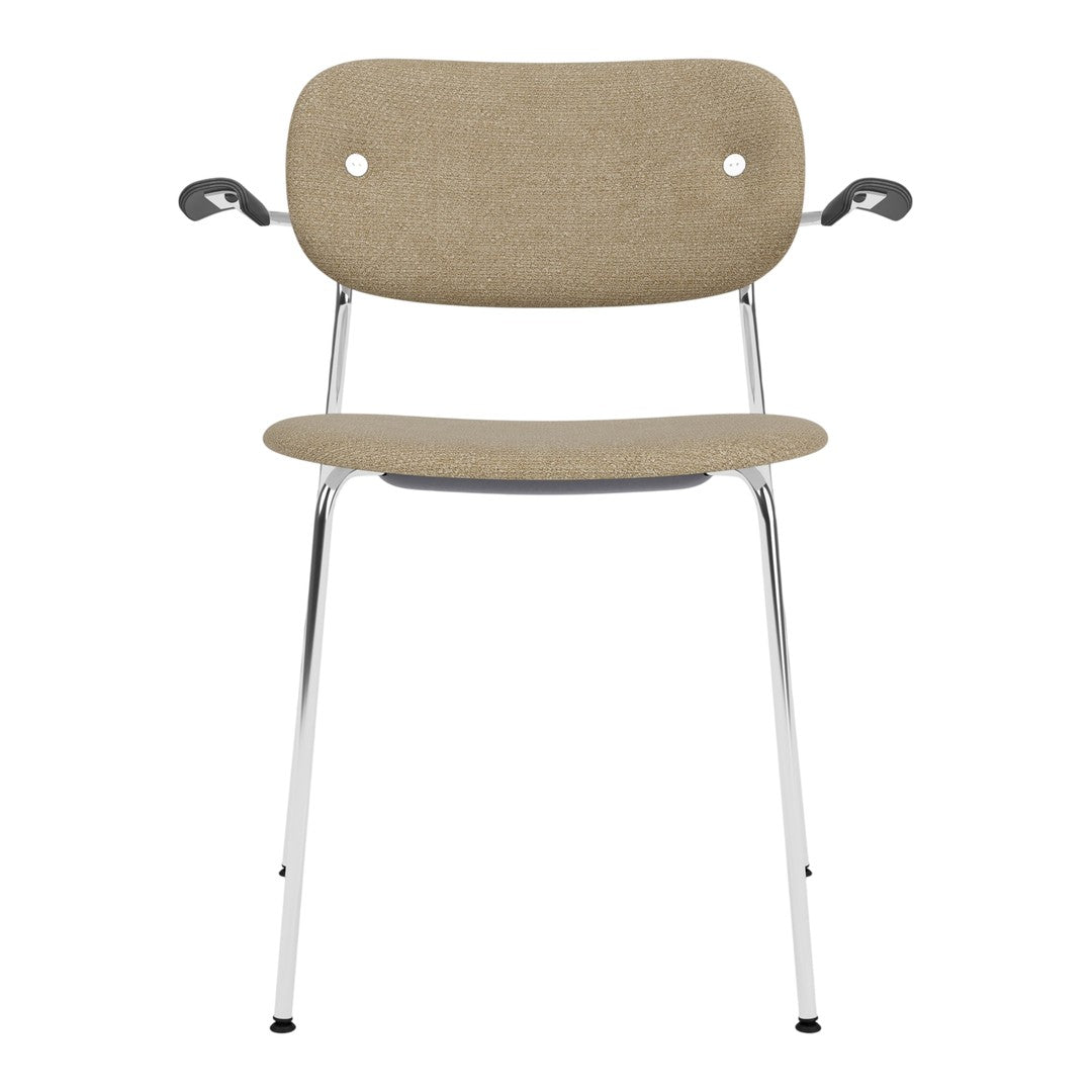 Beige upholstered chair with a smooth, minimalist design and chrome legs. Perfect for modern interiors.