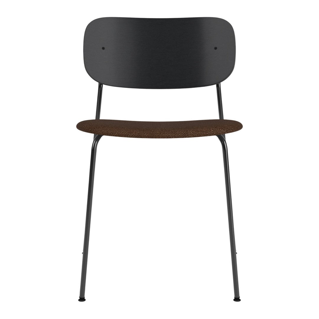 Black metal chair with wood grain seat, minimalist design, and smooth lines. Perfect for modern decor.
