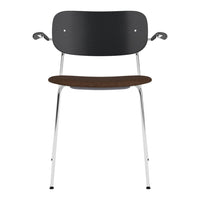 Black curved backrest chair with a walnut seat and sleek chrome legs, perfect for modern interiors.