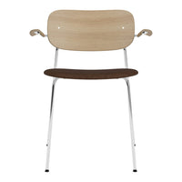 Light wood chair with a natural finish, brown seat, and chrome legs for a modern aesthetic.