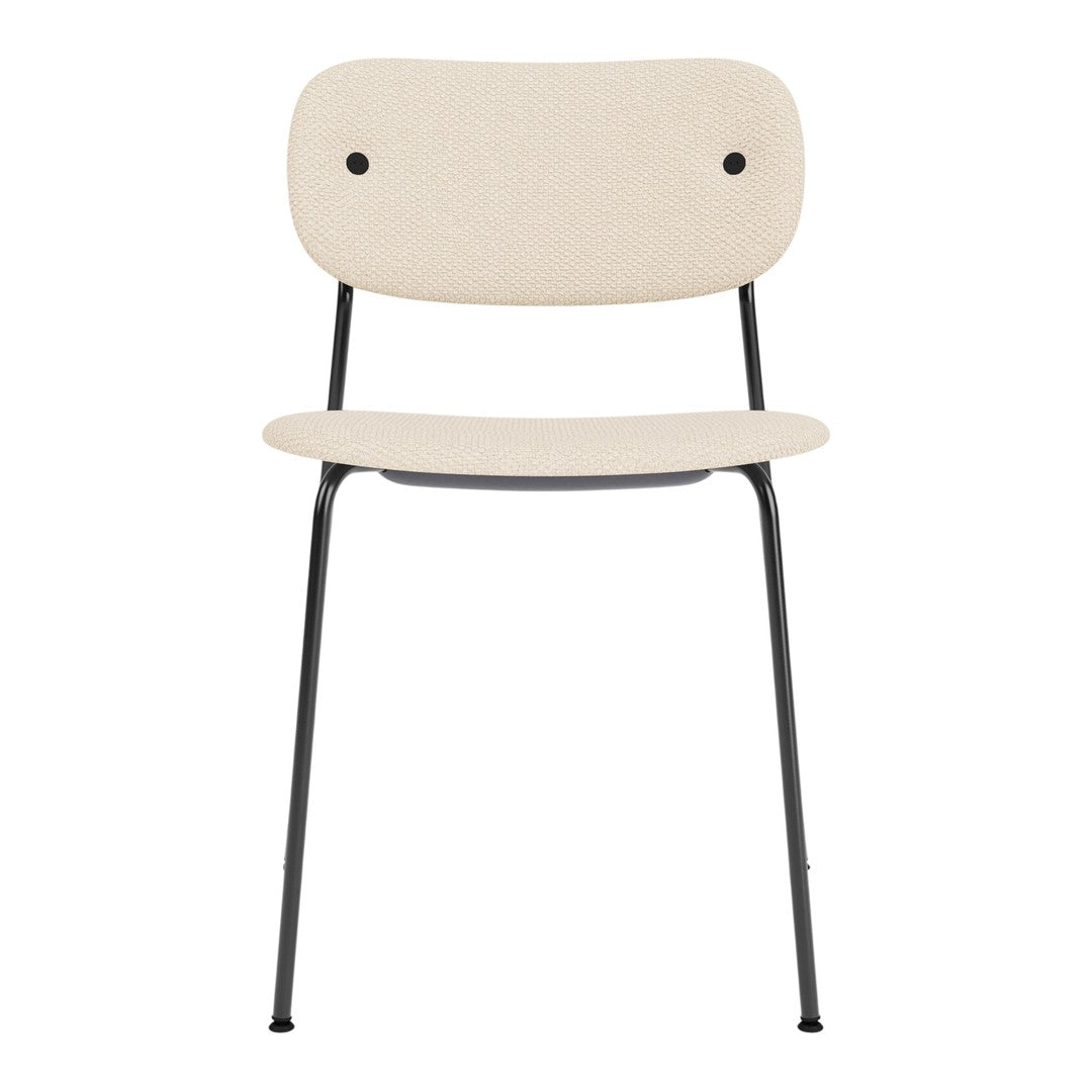Cream-colored chair with a simple design and black metal legs, featuring a smooth, solid surface.