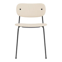 Cream-colored chair with a simple design and black metal legs, featuring a smooth, solid surface.