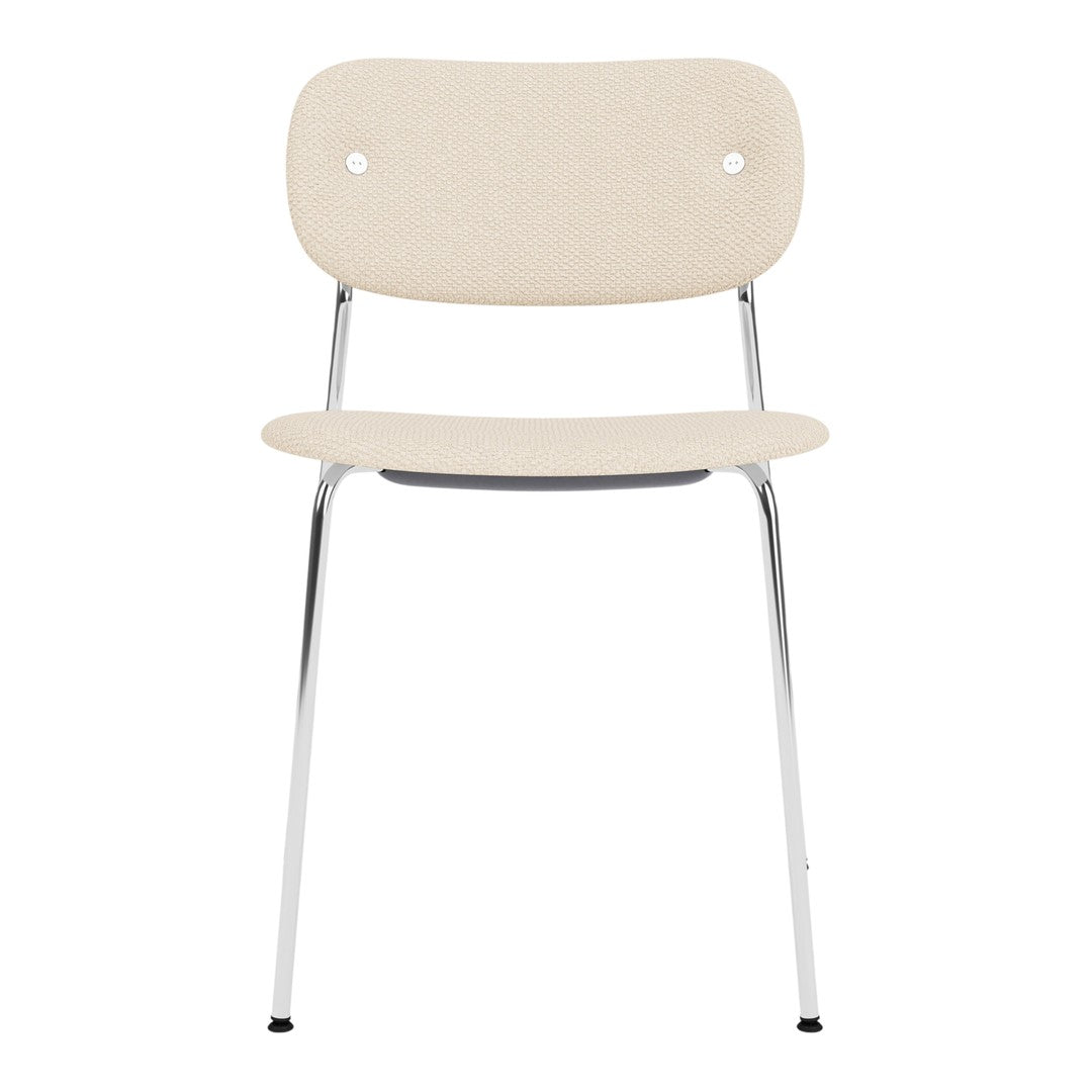 Beige dining chair with a minimalist design and chrome legs, featuring a smooth, solid pattern.