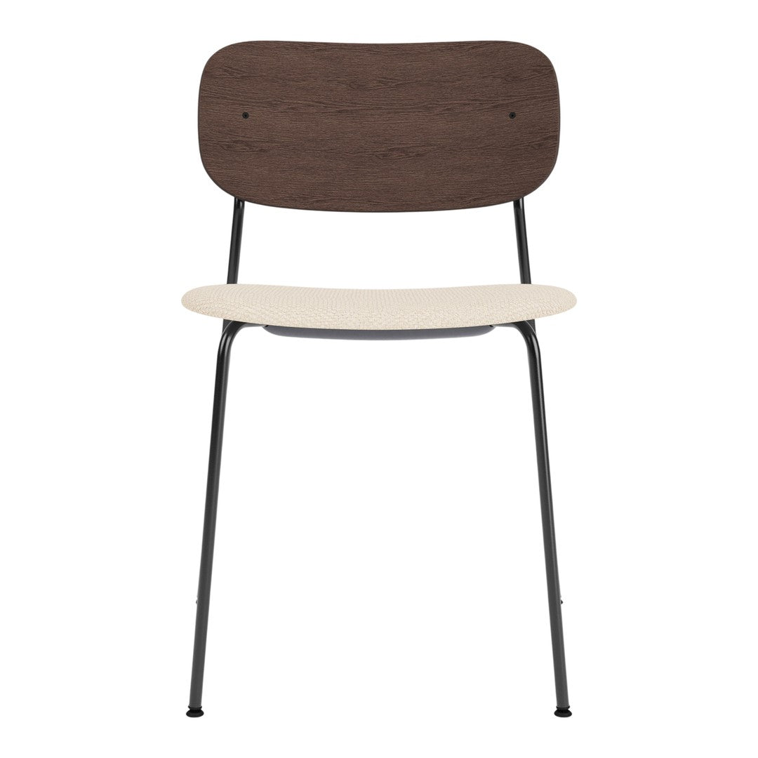 Modern chair with a brown wood backrest and cream seat, complemented by sleek black metal legs.