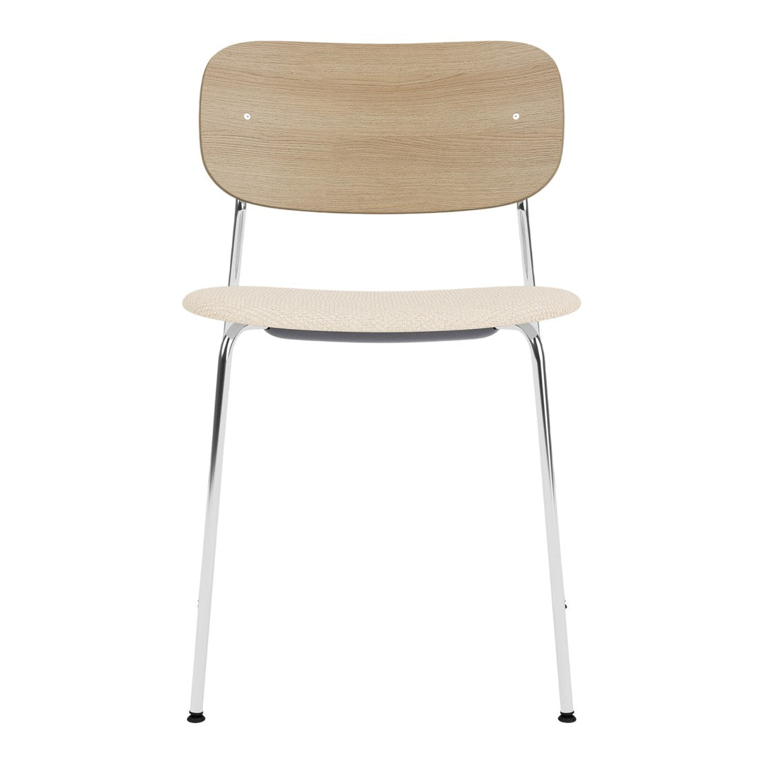 Light wood chair with a smooth finish and chrome legs, featuring a minimalist design and natural tones.
