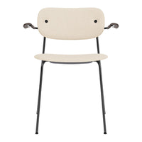 Beige chair with a smooth finish and black metal legs, featuring minimalistic design and rounded edges.