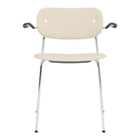 Beige chair with a smooth, minimalist design and chrome legs, featuring a clean, modern aesthetic.