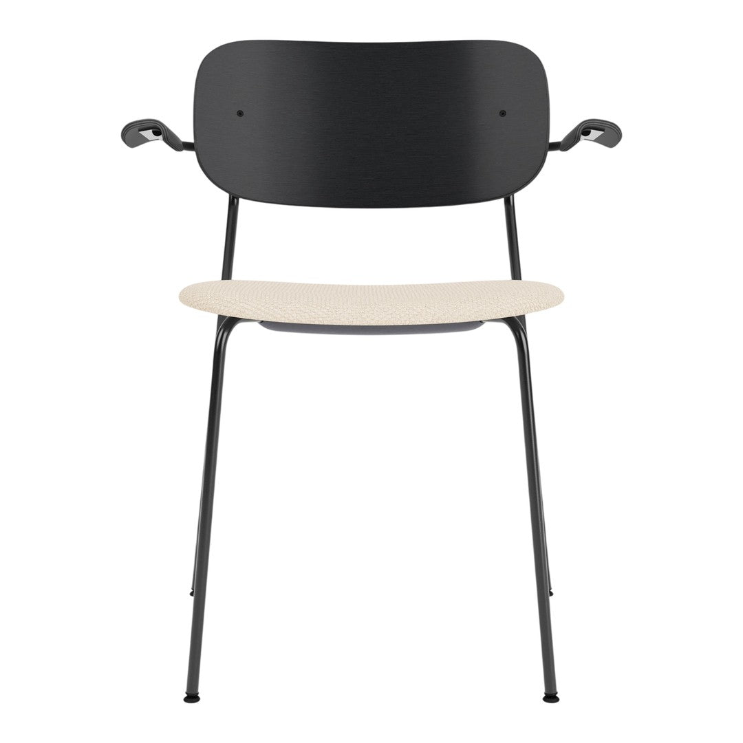 Black metal chair with a minimalist design and a contrasting light beige seat. Perfect for modern decor.