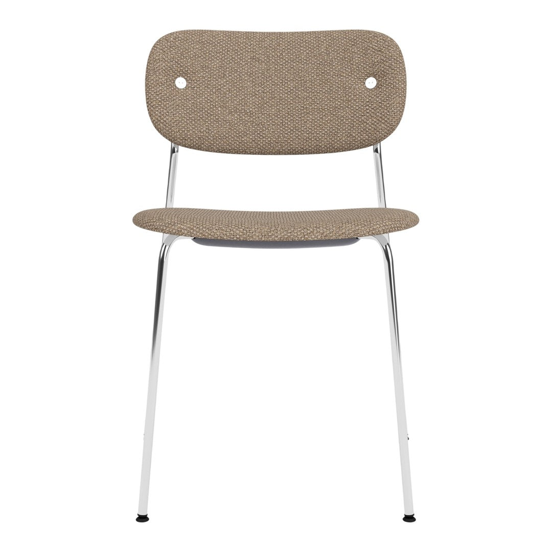 Light brown upholstered chair with smooth, minimalist design and chrome legs. Perfect for modern decor.