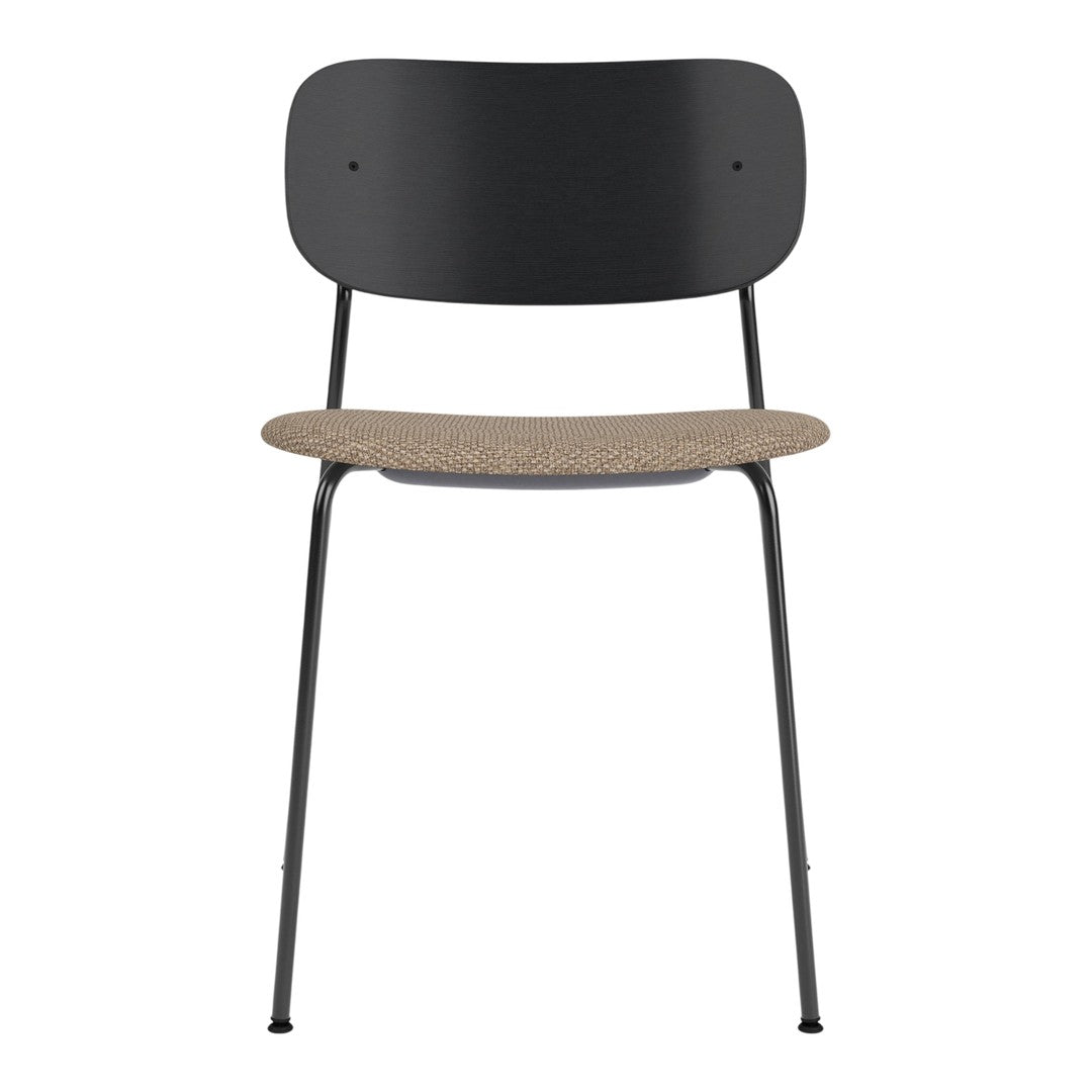 Stylish black metal chair with a natural cork seat, featuring a sleek and modern design. Ideal for contemporary spaces.