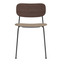 Brown wooden backrest, tan cork seat, and black metal legs create a modern, minimalist chair design.