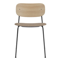 "Light wood chair with natural grain and minimalist black metal legs, offering a modern, sleek design."