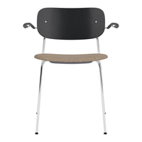 Black and beige chair with a sleek chrome frame and curved backrest, perfect for modern interiors.