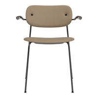 Tan chair with sleek, minimalist design and black metal legs. Smooth, solid surfaces for modern aesthetics.